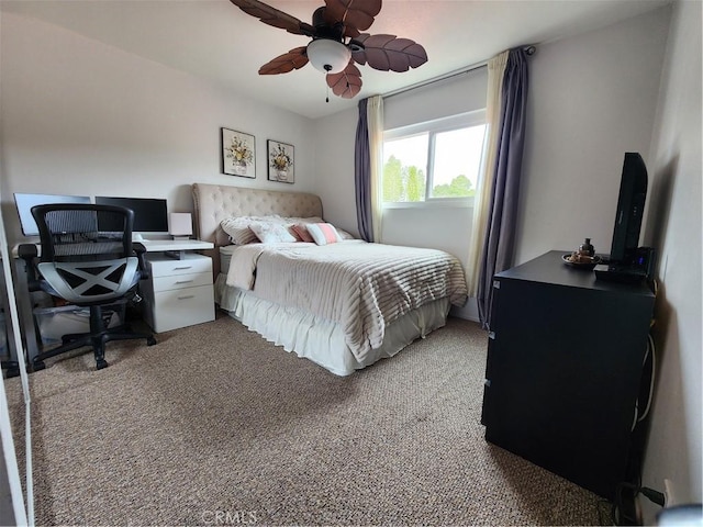 bedroom with light colored carpet and a ceiling fan