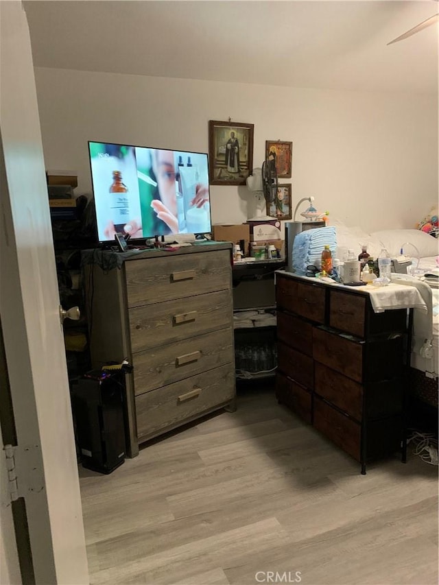 bedroom featuring light wood-style floors