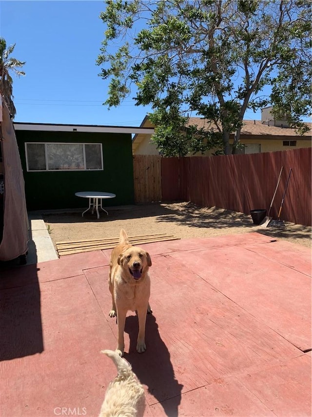 view of patio / terrace with fence
