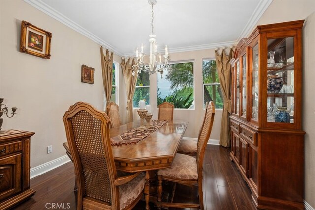 dining space featuring crown molding, dark wood-style flooring, a chandelier, and baseboards