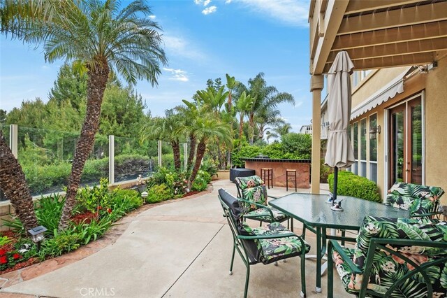 view of patio featuring outdoor dining space