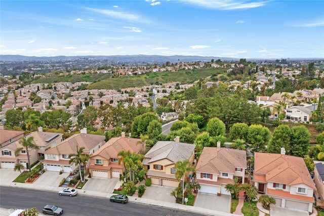 birds eye view of property featuring a residential view and a mountain view