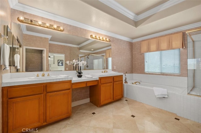 bathroom with crown molding, a sink, double vanity, a stall shower, and a bath