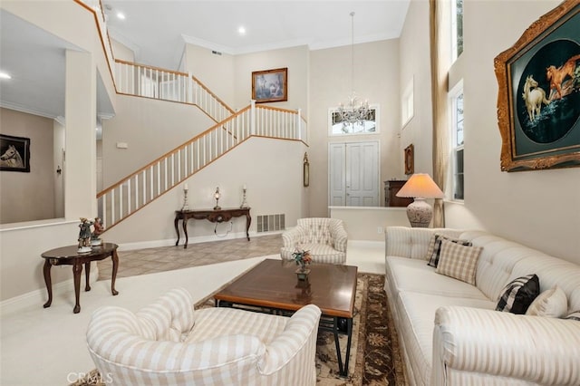 living room with recessed lighting, stairway, visible vents, ornamental molding, and a towering ceiling