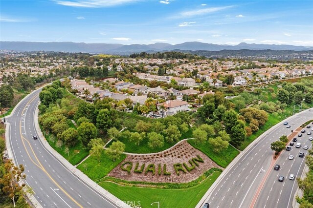 aerial view featuring a residential view and a mountain view
