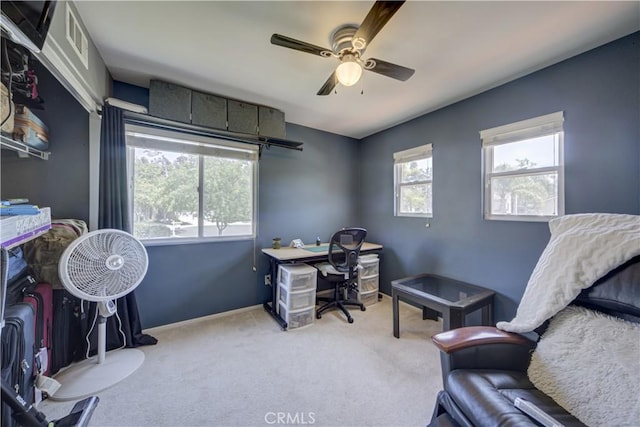 32851 Naples Ct, Temecula, CA 92592 - carpeted home office with visible vents, ceiling fan, baseboards, and a healthy amount of sunlight