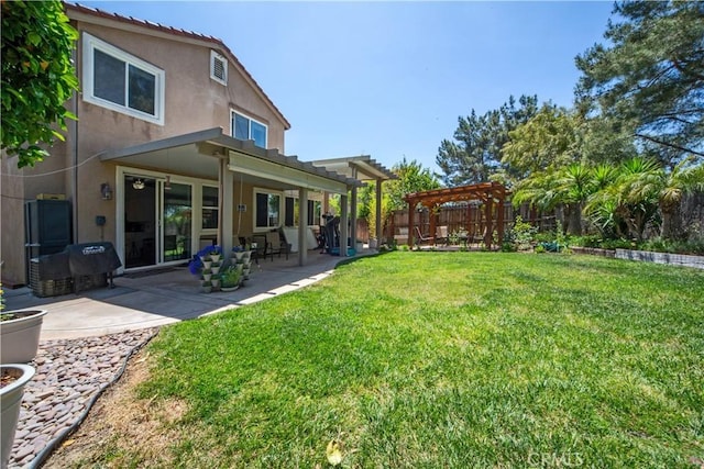 32851 Naples Ct, Temecula, CA 92592 - back of house featuring a pergola, a patio, a fenced backyard, a lawn, and stucco siding