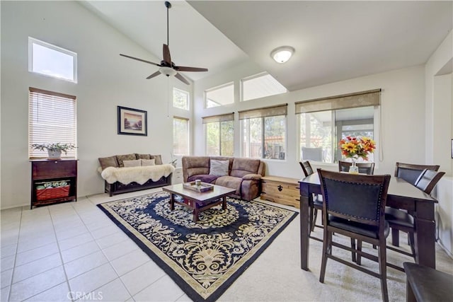 32851 Naples Ct, Temecula, CA 92592 - living area featuring light tile patterned floors, ceiling fan, and high vaulted ceiling