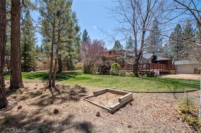 view of yard with a deck