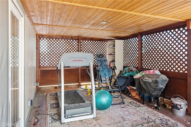 exterior space with wood ceiling and hardwood / wood-style flooring