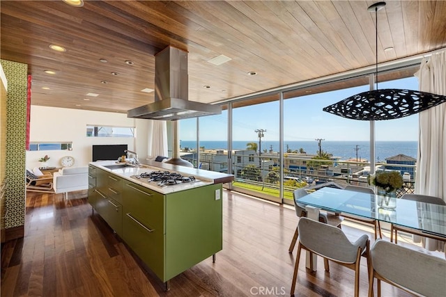 kitchen with a sink, wooden ceiling, stainless steel gas stovetop, green cabinets, and island range hood