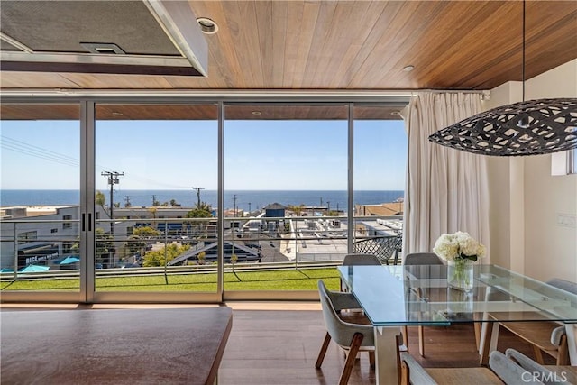 sunroom with a water view