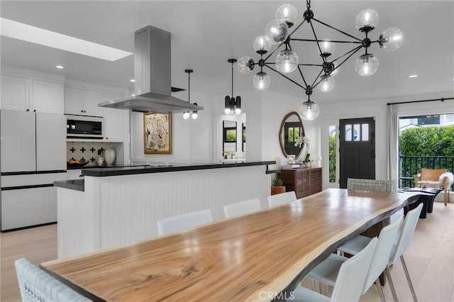 1012 10th St, Manhattan Beach, CA 90266 - dining space with recessed lighting and a notable chandelier