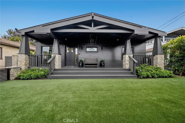 1012 10th St, Manhattan Beach, CA 90266 - back of property with a yard and covered porch