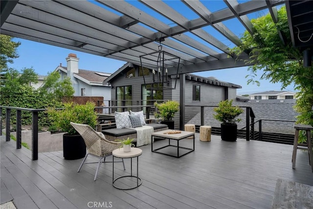 1012 10th St, Manhattan Beach, CA 90266 - wooden deck featuring an outdoor living space with a fire pit and a pergola