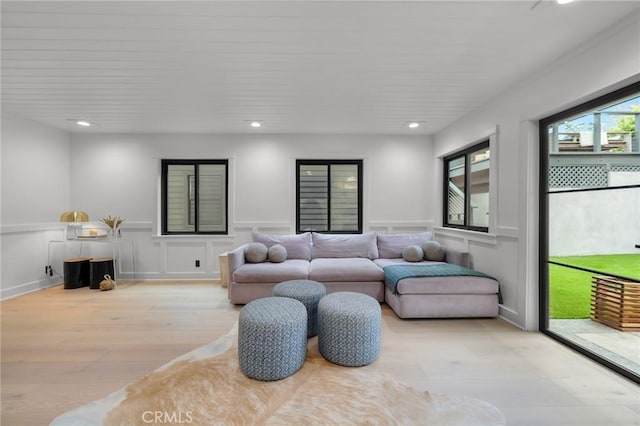 1012 10th St, Manhattan Beach, CA 90266 - living area featuring recessed lighting, wainscoting, light wood-style flooring, and a decorative wall