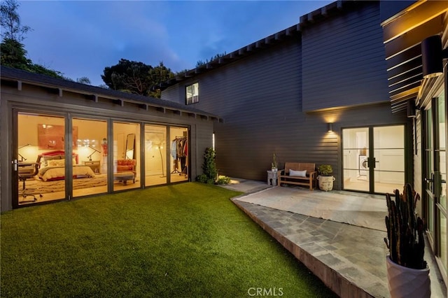 1012 10th St, Manhattan Beach, CA 90266 - rear view of property with a lawn, a patio area, and french doors