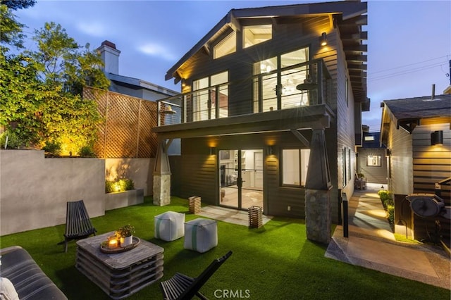 1012 10th St, Manhattan Beach, CA 90266 - back of house featuring a patio area, a fire pit, a yard, and a balcony