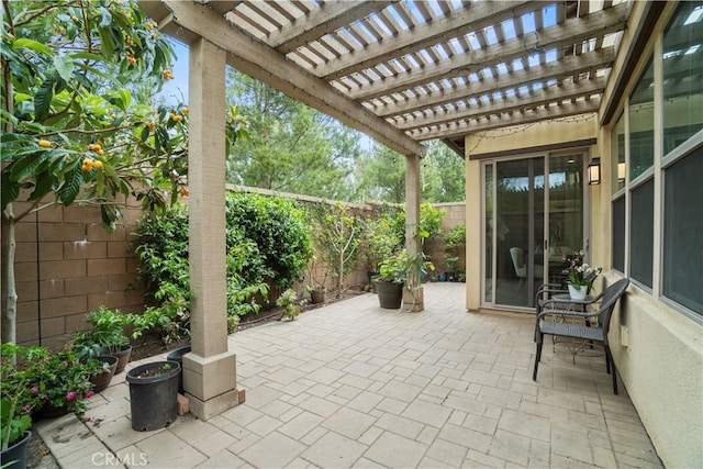 view of patio / terrace with a pergola and a fenced backyard