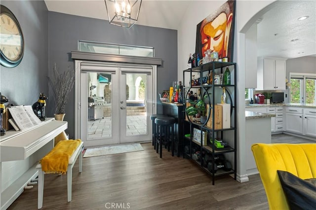 13656 Dronfield Ave, Sylmar, CA 91342 - foyer with arched walkways, french doors, recessed lighting, and wood finished floors