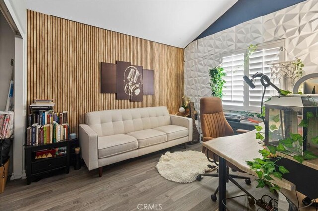 13656 Dronfield Ave, Sylmar, CA 91342 - home office with vaulted ceiling, wallpapered walls, and wood finished floors