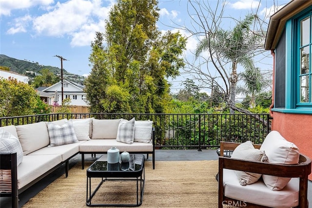 exterior space featuring an outdoor hangout area