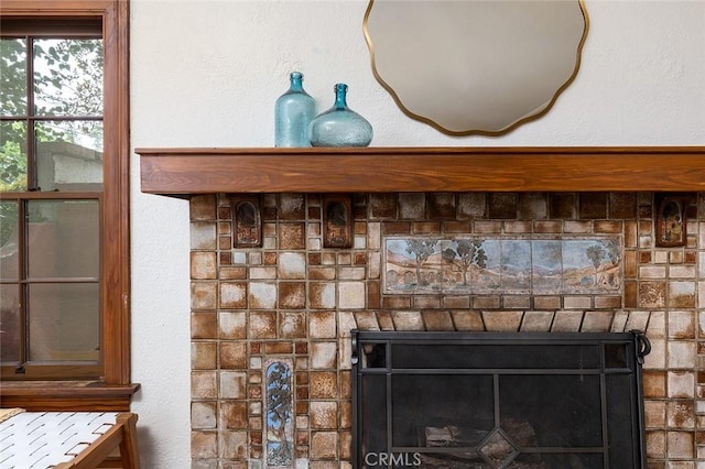 interior details with a fireplace