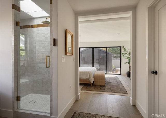 459 E 18th St, Costa Mesa, CA 92627 - full bathroom featuring wood finished floors and a shower stall