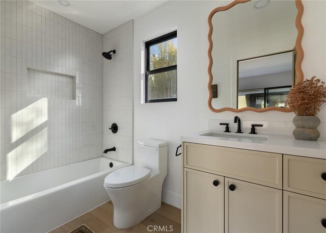 459 E 18th St, Costa Mesa, CA 92627 - bathroom featuring vanity, wood finished floors, and bathing tub / shower combination