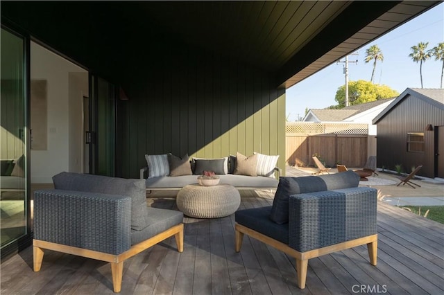 459 E 18th St, Costa Mesa, CA 92627 - wooden deck featuring an outdoor living space with a fire pit