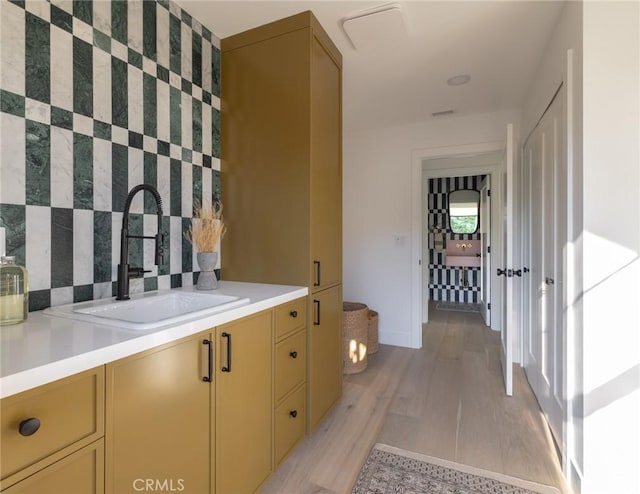 459 E 18th St, Costa Mesa, CA 92627 - bathroom with tasteful backsplash, vanity, and wood finished floors