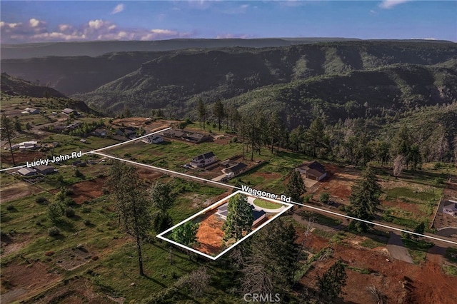 bird's eye view featuring a mountain view