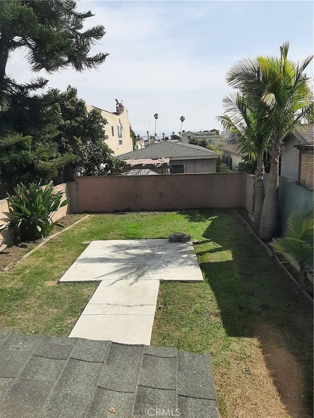 view of yard with fence