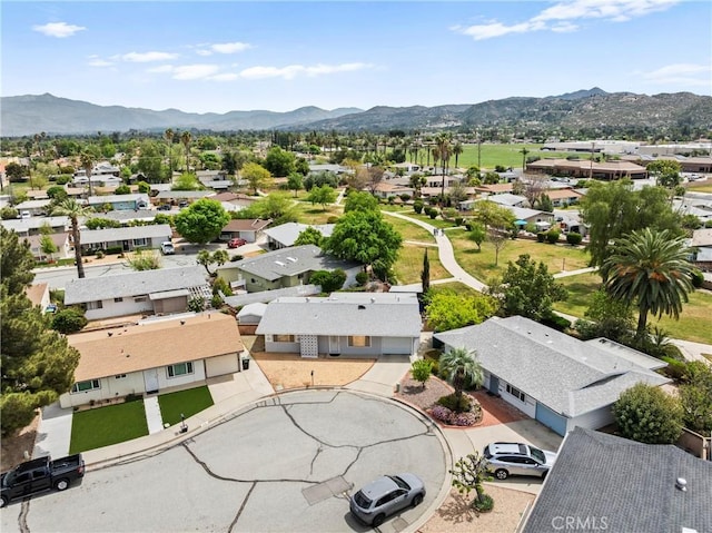 aerial view featuring a mountain view and a residential view
