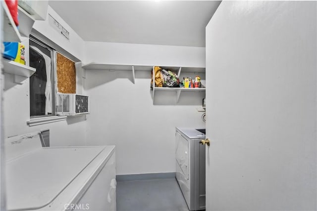 laundry room featuring washer and clothes dryer and laundry area
