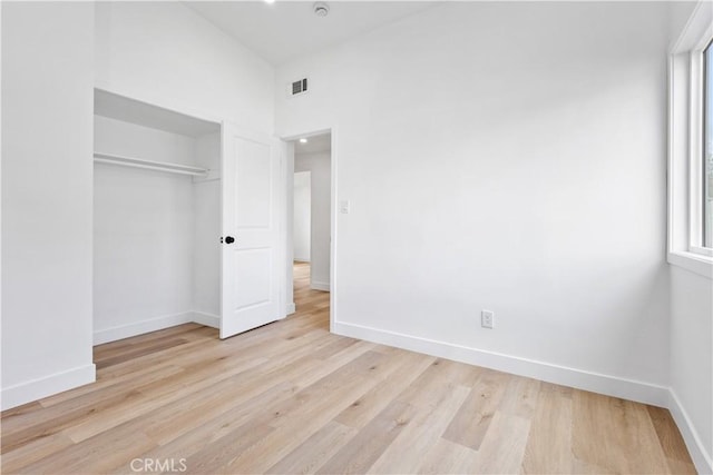 1758 Bainbridge St, Pomona, CA 91766 - unfurnished bedroom with a closet, baseboards, visible vents, and light wood-style floors