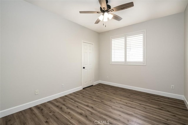 30461 Savoie St, Murrieta, CA 92563 - empty room with baseboards, ceiling fan, and dark wood finished floors