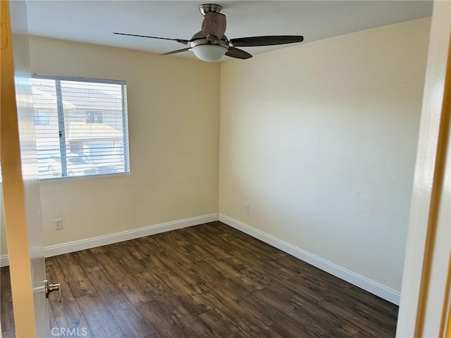 4219 La Pinata Unit 255, Oceanside, CA 92057 - empty room with dark wood finished floors, baseboards, and ceiling fan