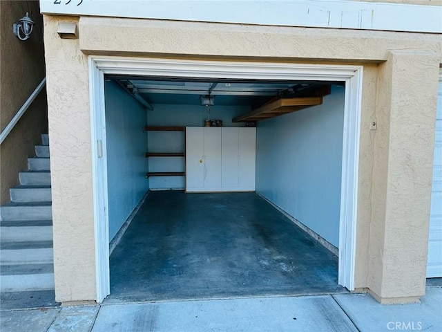 4219 La Pinata Unit 255, Oceanside, CA 92057 - garage with a garage door opener