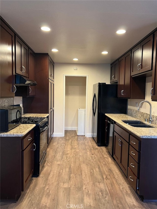 4219 La Pinata Unit 255, Oceanside, CA 92057 - kitchen featuring a sink, black appliances, under cabinet range hood, dark brown cabinetry, and recessed lighting