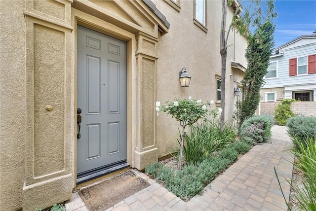 2882 E Via Terrano, Ontario, CA 91764 - doorway to property with stucco siding