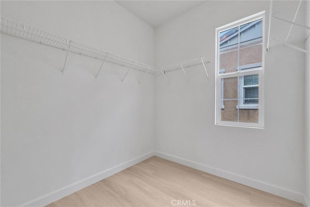 2882 E Via Terrano, Ontario, CA 91764 - walk in closet with wood finished floors