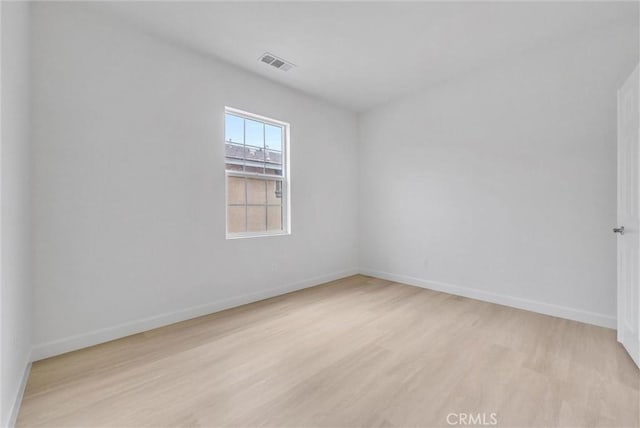 2882 E Via Terrano, Ontario, CA 91764 - spare room with light wood-type flooring and baseboards