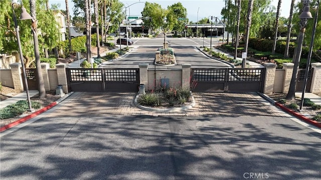 2882 E Via Terrano, Ontario, CA 91764 - view of property's community with a gate