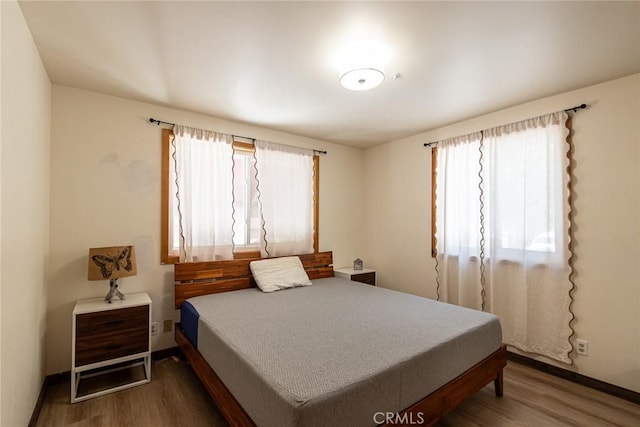 41505 Alder Dr, Forest Falls, CA 92339 - bedroom featuring baseboards and wood finished floors