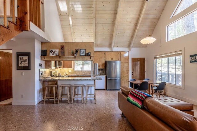 26704 Raven Rd, Wrightwood, CA 92397 - living area featuring a high ceiling, wooden ceiling, and beamed ceiling