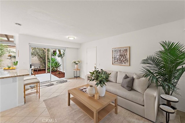 living room with light tile patterned floors