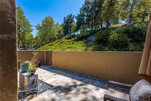 view of patio / terrace with a gate and fence