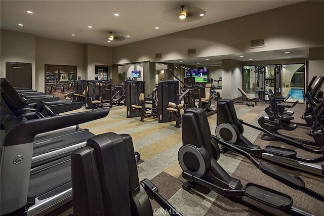 gym with carpet floors, recessed lighting, and visible vents