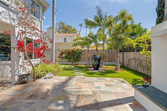 view of patio featuring a fenced backyard